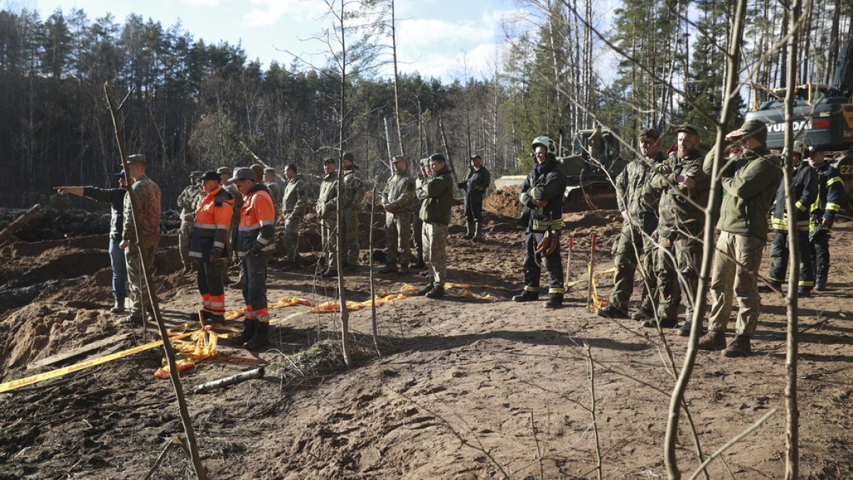 us lithuania work to drain swamp in search of missing us soldiers U1aO8QmC