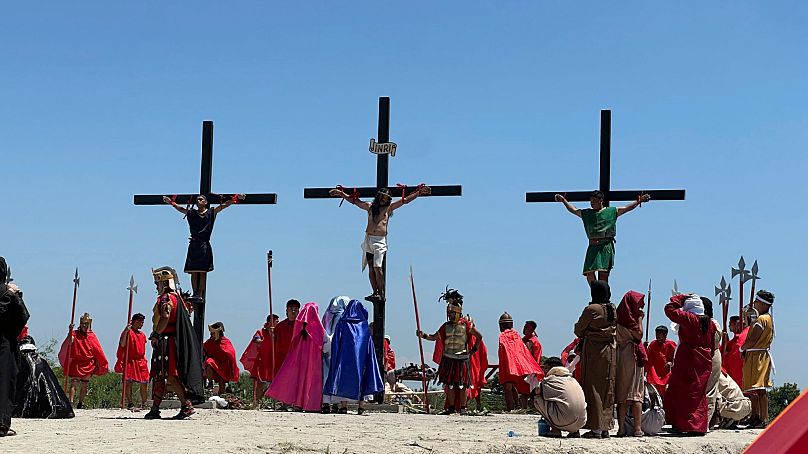 Christians take part in Good Friday processions to mark Christ's crucifixion 2 christians take part in good friday processions to mark christs crucifixion 1 VfDSADef