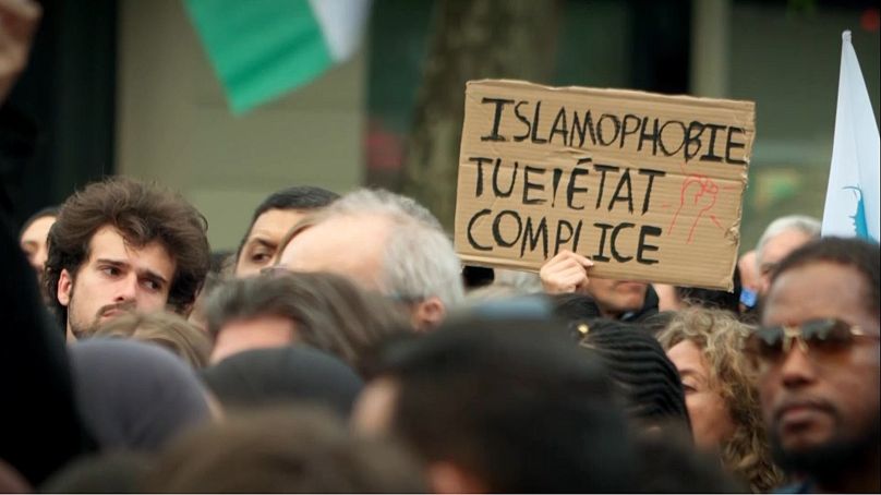 Hundreds gather in Paris as French Muslim community mourns death of man brutally killed in mosque 1 hundreds gather in paris as french muslim community mourns death of man brutally killed FfdjOmvT