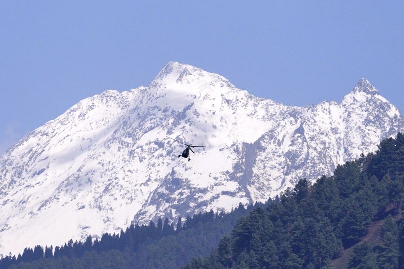 Indian authorities hunt Kashmir shooters as Modi cuts Saudi trip short 1 indian authorities hunt kashmir shooters as modi cuts saudi trip short 0