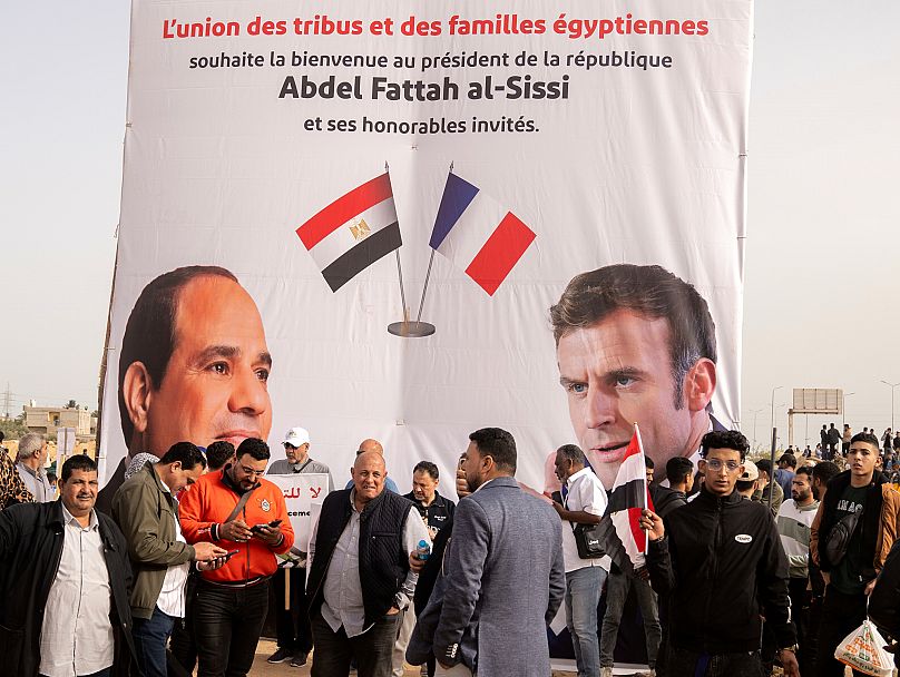 Macron urges flow of aid into Gaza on visit to Egyptian humanitarian workers near Strip 1 macron urges flow of aid into gaza on visit to egyptian humanitarian workers near
